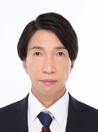 梅田修作町長の顔写真